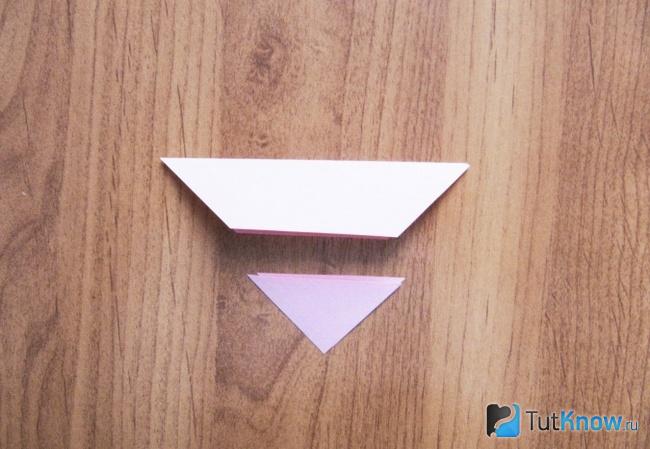 Отрезанный уголок бумажного квадратика